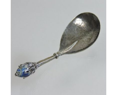 An early 20th century silver caddy spoon, with a planished silver bowl and lapiz lazuli terminal, by Liberty and Co., Birming