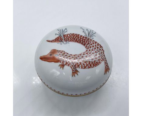 Rare first edition hand painted round lidded porcelain box with gilded accents. Herend backstamp on the bottom. Dimensions: 4