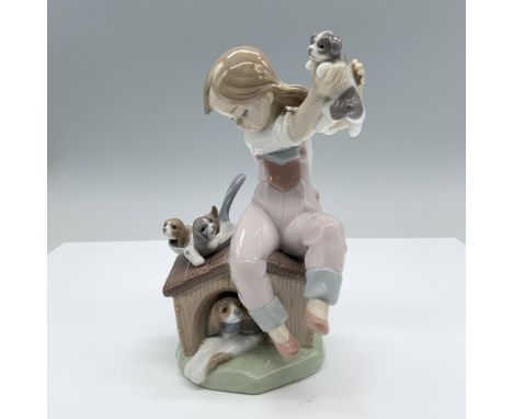 Glossy finish. Features a charming little girl with her dog and their breeds in a doghouse. Lladro backstamp. This item has i