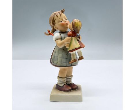 Features a girl in pigtails puckering up to kiss her doll. Goebel Hummel backstamp. Issued: 20th centuryDimensions: 3"L x 2.2