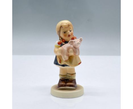Features a girl in pigtails holding a pig. M.I Hummel Club, Membership year 1999/2000. This item has its original box measuri