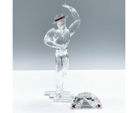Second figurine of the Magic of Dance trilogy. Brilliant cut crystal reflecting the movement of dance, adorned with red cryst