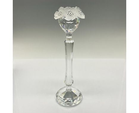 This Swarovski crystal candleholder was made in the hole style only and is designed to hold one candle. It has frosted flower