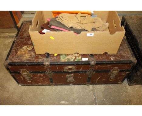 A metal bound travelling trunk