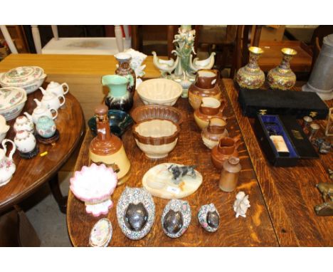 An onyx ashtray mounted with a dog; three various jelly moulds; Harvest ware jugs; a Bell's Scotch whisky decanter etc.