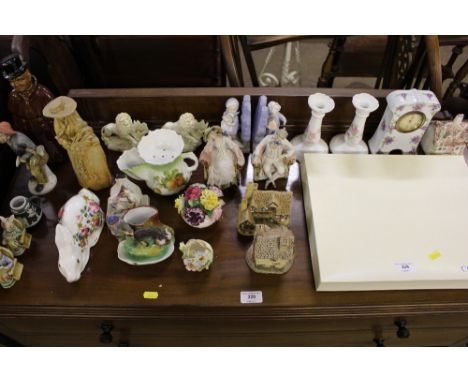 A quantity of various decorative figures; a pair of candlesticks; a mantel clock; a Coalport plate in original box etc.