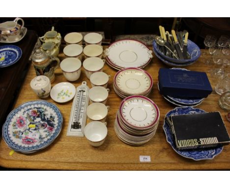 A quantity of late Victorian gilt decorated teaware; various blue and white china; a Continental stein; various cutlery; a th