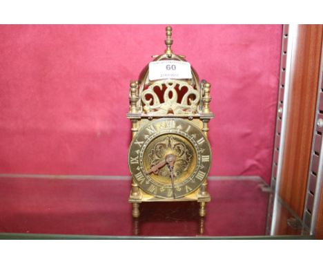 A Smiths eight day brass lantern clock