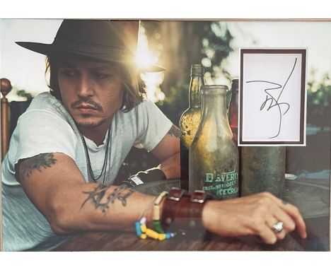 Johnny Depp 10x14 colour presentation photo with matted signed card. Depp made his debut in the horror film A Nightmare on El