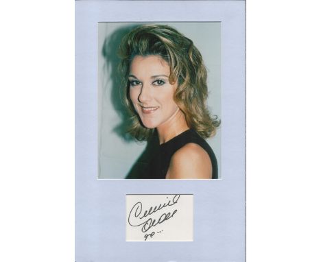 Celine Dion autograph mounted display. A Mounted with photograph to approx. 16 x 12 inches overall. Good condition. All autog