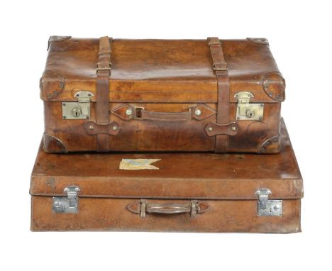 A BROWN LEATHER SUITCASELATE 19TH / EARLY 20TH CENTURYthe lid with initials 'J.P.' with 'Secure Locks', together with a leath