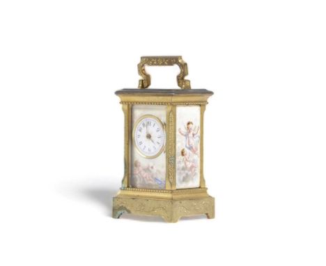 A MINIATURE FRENCH GILT BRASS AND PORCELAIN CARRIAGE TIMEPIECELATE 19TH CENTURYthe eight day movement with a verticle, silver