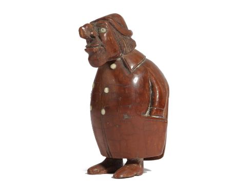 A COQUILLA NUT FIGURAL SNUFF BOX OF A HUNCHBACKPROBABLY FRENCH, LATE 18TH / EARLY 19TH CENTURYwith glass eyes and buttons, wi