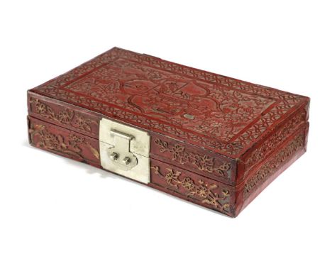 A CHINESE RED LEATHER ARTIST'S BOXQING DYNASTYwith tooled decoration of flowers, leaves and auspicious symbols with traces of