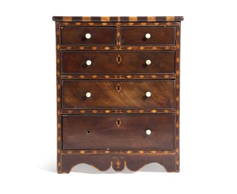 λ A REGENCY MAHOGANY MINIATURE CHESTPOSSIBLY SCOTTISH, EARLY 19TH CENTURYwith two short and three graduated long drawers with