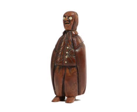 A COQUILLA NUT FIGURAL SNUFF BOX OF A MANPROBABLY FRENCH, LATE 18TH / EARLY 19TH CENTURYwith glass eyes and buttons, with a b