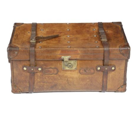 A BROWN LEATHER TRUNK BY ARMY & NAVY, LATE 19TH / EARLY 20TH CENTURYthe lid with initials 'U.H.' , the lined interior with a 