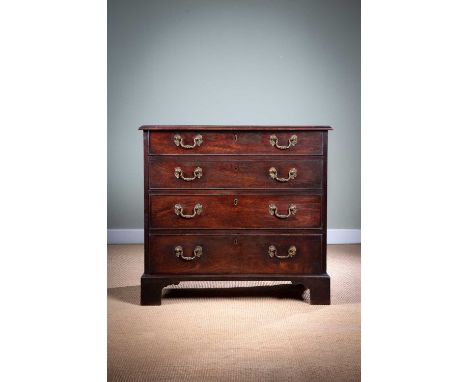 AN EARLY GEORGE III MAHOGANY CHESTC.1760-70the caddy moulded top above four graduated long cockbeaded drawers and bracket fee