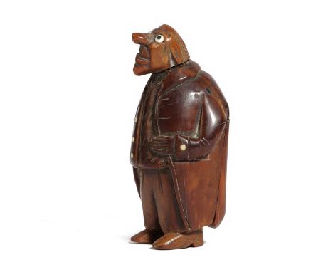 A COQUILLA NUT FIGURAL SNUFF BOX OF A HUNCHBACKPROBABLY FRENCH, LATE 18TH / EARLY 19TH CENTURYwith glass eyes and buttons, a 