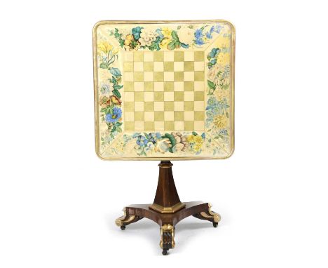 λ A REGENCY ROSEWOOD AND PARCEL-GILT FIRESCREEN CUM GAMES TABLEEARLY 19TH CENTURYthe tilt-top with a gilt and cream chequers 