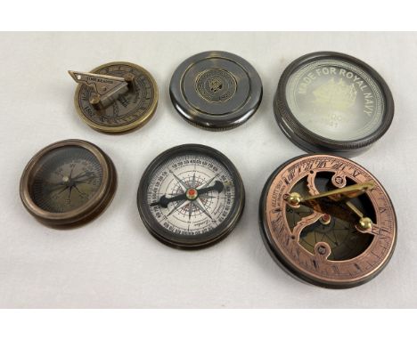 3 metal cased naval compasses. A small brass cased compass with folding sundial screw top lid (approx. 5cm diameter); a large