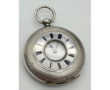 A small antique Argent 935 silver half hunter pocket watch with enamelled dial, roman numeral markers and blue steel hands. E