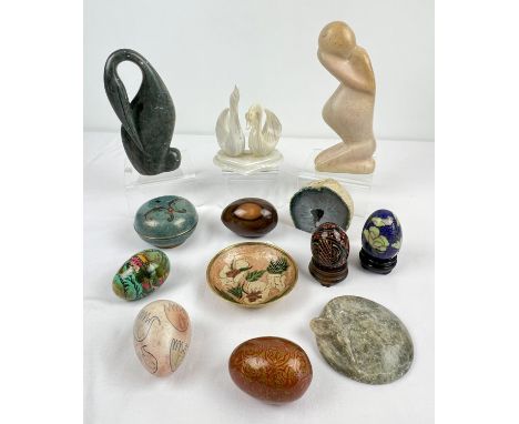 A collection of assorted natural stone, enamelled and wooden items to include carved soapstone figures, cloisonnÃ© egg and li