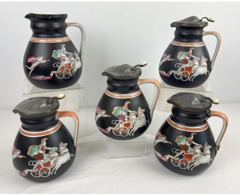 A set of 5 19th century Ashworth pottery Neoclassical Greek design Iliad jugs with black ground, circa 1860. From a series of