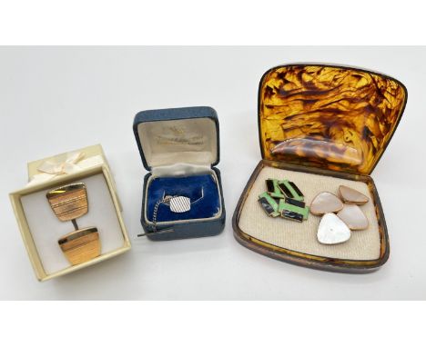 3 pairs of vintage cuff links, to include Art Deco style green and black enameled. Together with a silver tie pin with engine