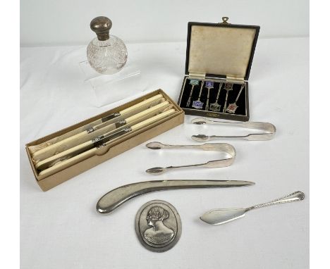 An early 20th century silver topped perfume bottle together with a collection of assorted silver plated &amp; cutlery items. 