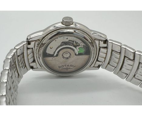 A boxed 10713 automatic wristwatch by Rotary. Stainless steel case and strap, white face with silver tone hour markers and ha
