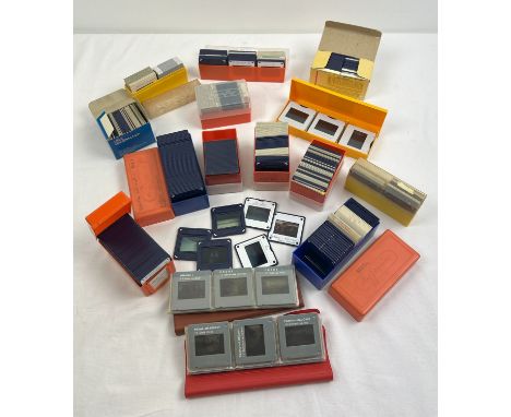 15 small vintage slide cases containing a collection of projector slides showing landscapes, animals and native people from K