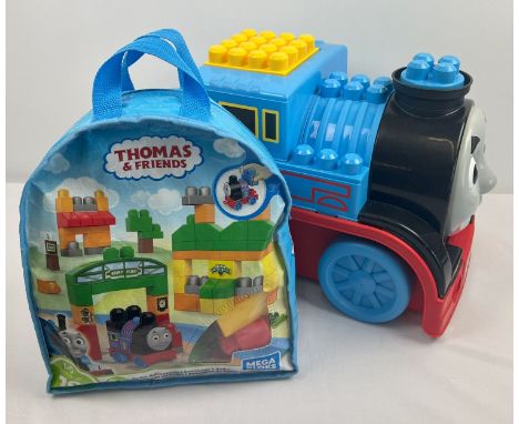 2 Thomas the Tank Engine Mega Bloks play sets. Giant Thomas train with Mega Bloks inside together with bagged set for buildin