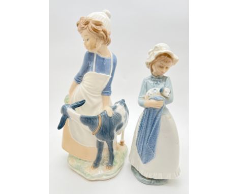 2 large Nao Spanish ceramic figurines. Girl with Goat (approx. 30cm tall) together with a girl holding a puppy (approx. 25cm 