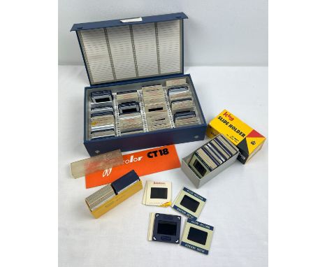 An index case and 2 small boxes of vintage projector slides showing various birds and their nests. 