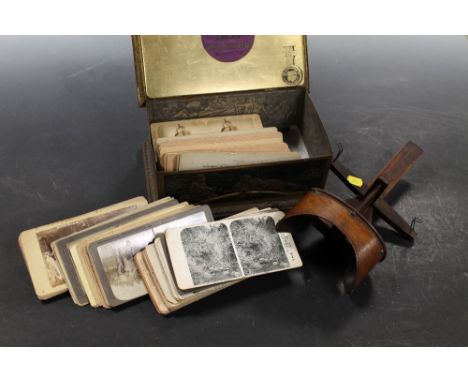 A VINTAGE SLIDE VIEWER + A TIN OF SLIDES