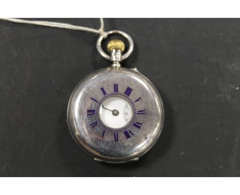 A SILVER AND ENAMEL POCKET WATCH