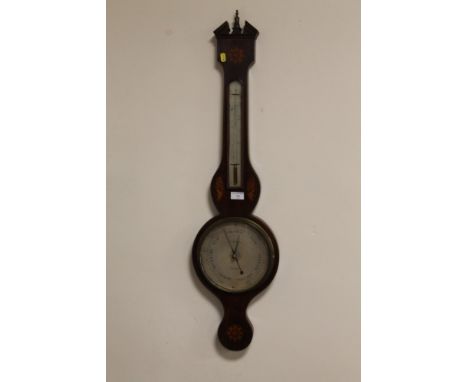 A MAHOGANY CASED BAROMETER