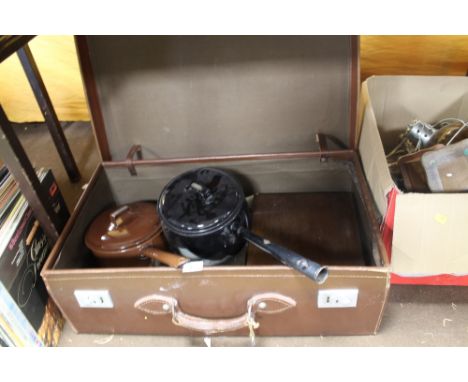 A VINTAGE LEATHER SUITCASE AND CONTENTS