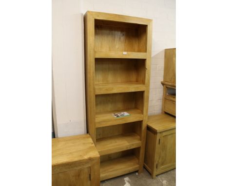 ** A MODERN LIGHT OAK OPEN FRONT BOOKCASE *