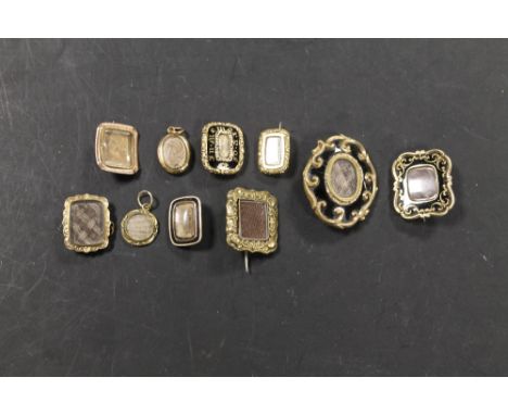 A COLLECTION OF 19TH CENTURY MOURNING BROOCHES SOME WITH ENAMEL