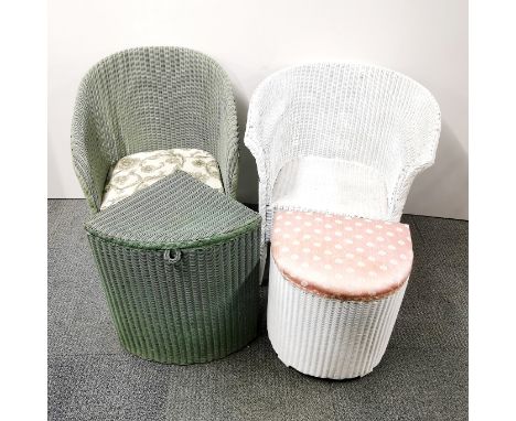 Two painted wicker chairs with a wicker hamper and wicker storage stool.