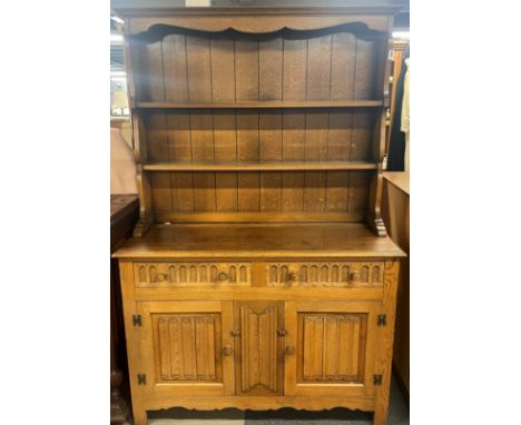 A light oak dresser, W. 120cm, H. 183cm.