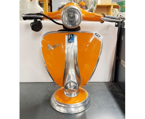 A contemporary Vespa inspired desk lamp.