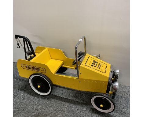 A vintage style metal pedal tow truck, L. 104cm.