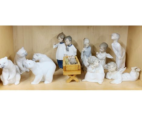 A group of Lladro and Nao (Choir boys) nativity and other figures.