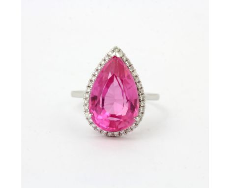 An 950 platinum ring set with a large 9.17ct pear cut natural pink sapphire surrounded by diamonds, ring size N, with GIL cer