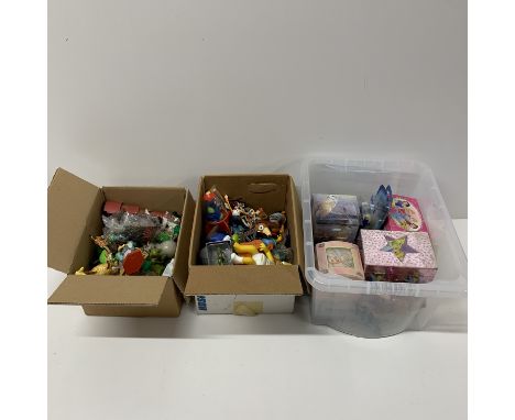 Two boxes of toys, including The Simpsons, Madagascar and others.