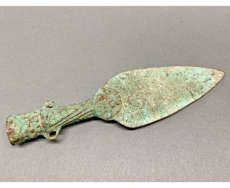 A Chinese bronze spearhead understood to be Warring states period, cc. 400BC. L. 25cm. Prov. N. Forbes collection, purchased 