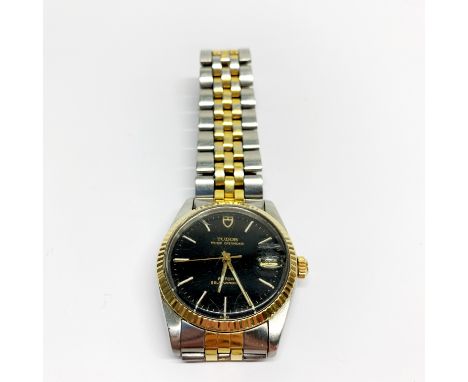 A gents black dial Tudor Prince Oysterdate self-winding wristwatch. Appears to be in working order but is not guaranteed.